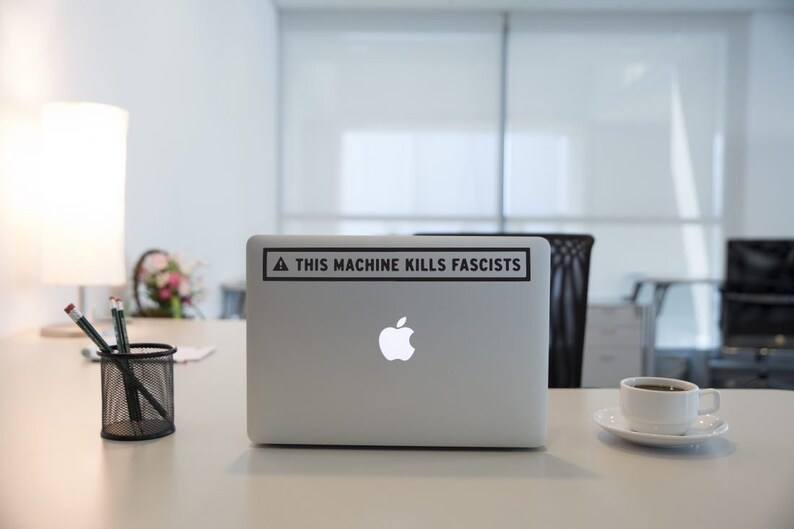 this machine kills fascists sticker mac