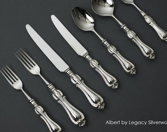 Nóż stołowy, widelec stołowy i łyżka deserowa ze srebra próby Albert Sterling