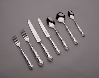 Queens 7 piece place setting in Hallmarked Sterling Silver Plus Table Spoon