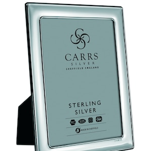 PLAIN  6”x4” Sterling silver photo frame with wood back.