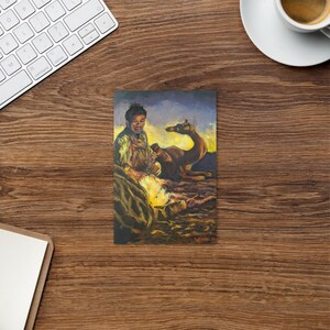 May include: A painting of a man sitting with a camel in a desert setting. The man is wearing a brown shirt and pants. The camel is brown and has a long neck. The background is a sunset sky with clouds. The painting is done in a realistic style.