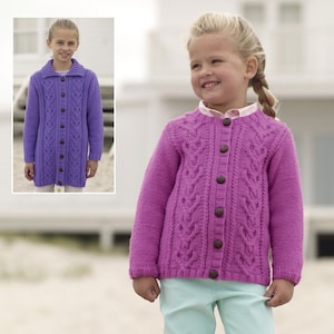 May include: A purple knitted cardigan with a cable knit pattern and button closure. The cardigan is worn by a young girl with blonde hair.