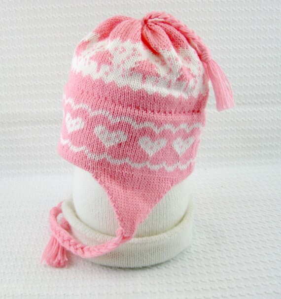 pink hat with ear flaps