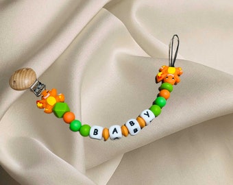 Pacifier hanger for baby Charmèche green and orange personalized first name