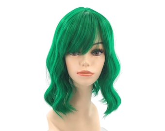May include: A vibrant green wig with a wavy, shoulder-length style. The wig features a side-swept bang and is displayed on a mannequin head. The bright color and style suggest a costume or fashion accessory.