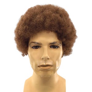 May include: A brown afro wig on a mannequin head. The wig is a light brown color and has a full, rounded shape. The mannequin has a neutral skin tone and is set against a white background.