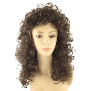 May include: A brown curly wig displayed on a mannequin head. The wig features voluminous, tightly curled hair with a natural-looking texture and highlights. The mannequin has a neutral expression and is set against a white background.