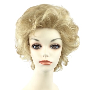May include: A blonde wig with a short, curly style. The wig is styled with a side part and has a natural-looking finish.