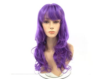 May include: A vibrant purple wig with long, wavy hair and a layered fringe. The wig is displayed on a mannequin head, showcasing its color and style. The hair has a natural-looking texture and is suitable for cosplay or costume events.