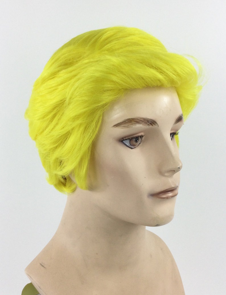 May include: A short, bright yellow wig with a side part and a textured finish.