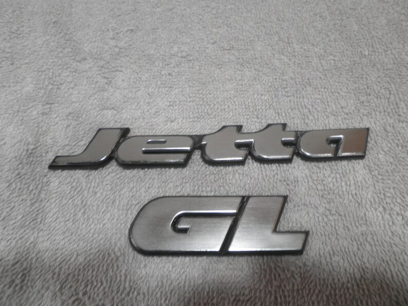199398 VW Jetta gl script trunk emblem badge logo jettagti red badge abs 1hm 853 687 ac\u2014 gl abs mex 38Z 1HM 853 875 B