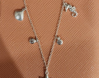 Sterling silver sea charm necklace