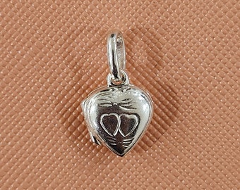 Tiny sterling silver lovers locket