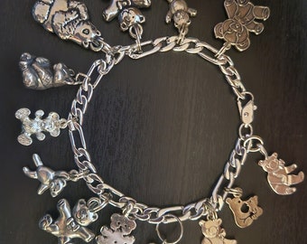 Vintage sterling silver teddy bear charm bracelet with 13 charms