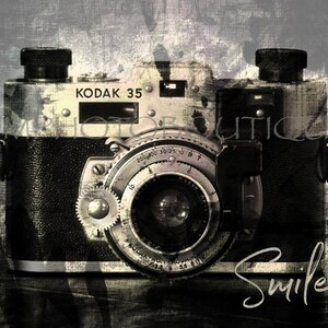 May include: A vintage black and silver Kodak 35 camera with a lens and a silver dial that reads "200 400 30 25 10 8 T B". The camera is on a textured background with the word "Smile!" written in white.