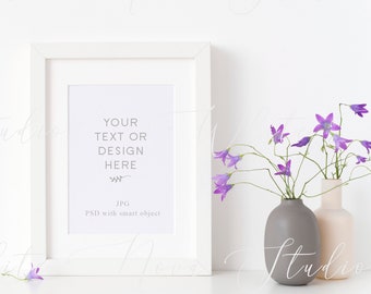 Download White Frame Mockup With Wild Bluebell Flowers Poster Mock Up Psd Floral Frame Mock Up Frame Mockup Frame Digital Download Canva 012 Psd Templates Envelope PSD Mockup Templates