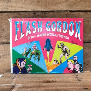 Flash Gordon into the Water World of Mongo by Rex Raymond: with Dust Jacket 1971