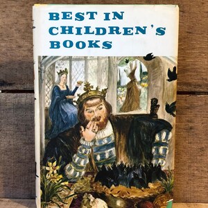 May include: A hardcover book titled Best in Children's Books with a dust jacket illustration featuring a king wearing a crown, sitting at a table with a pie filled with black birds, a queen in a blue dress, and a figure in a garden background.