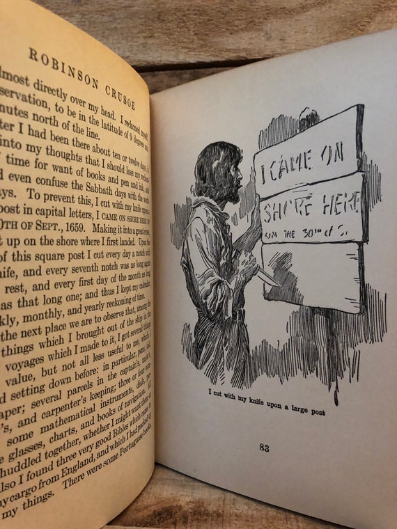 Robinson Crusoe By Daniel Defoe And Illustrated By Frank Godwin The John C Winston Company 1925