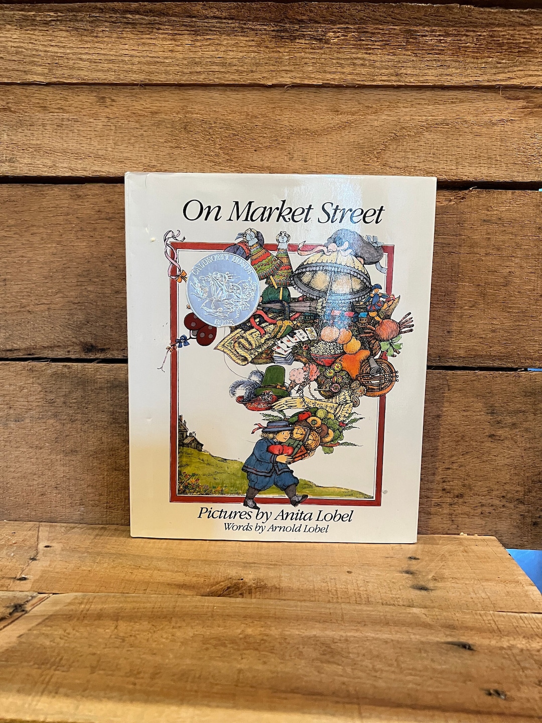 On Market Street by Arnold Lobel, Illustrated by Anita Lobel: With