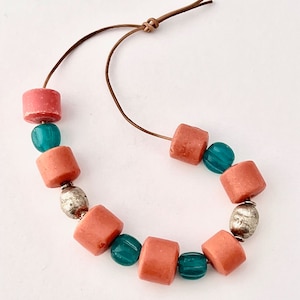 Set of Heavy Orange Glass Trade Beads, Smooth Barrels, With Teal Fluted Glass Trade Beads, Silvered Ethiopian Trade Beads, Vintage