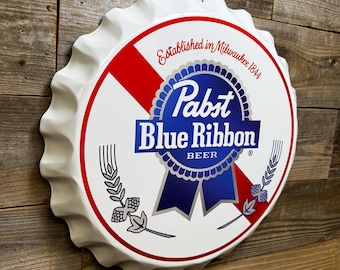 Pabst Blue Ribbon Metal Bottle Cap Wall Sign – 17” Vintage PBR Beer Sign – Rustic Bar Mancave Decor – Scalloped Edge Metal Pabst Decor
