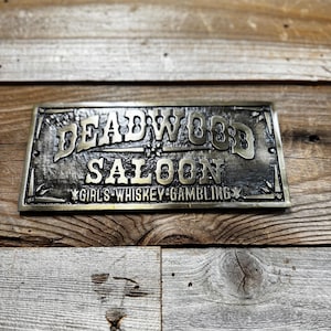 Deadwood Saloon Girls Whiskey Gambling Plaque (7.5” x 3.5”), Aluminum, raised Letters, Antique Brass Finish