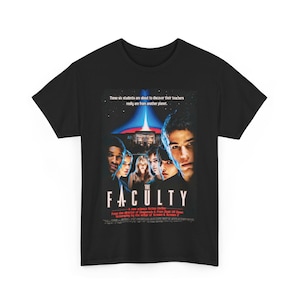 May include: Black t-shirt with a graphic print of the movie "The Faculty". The graphic features a group of students and the movie title in red. The text "These six students are about to discover their teachers really are from another planet." is printed above the graphic.
