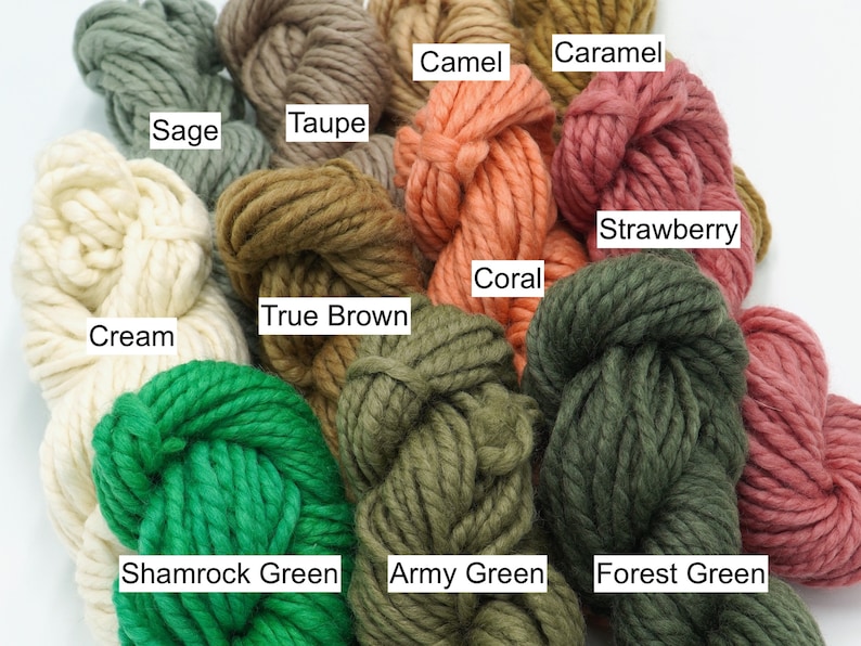 May include: A collection of yarn skeins in various colors, including cream, sage, taupe, true brown, shamrock green, army green, forest green, coral, strawberry, caramel, and camel.