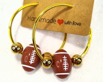 Football hoop earrings, football earrings, gold hoop football earring, football hoops, football jewelry, free shipping, fall sports. Jewelry