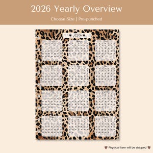 May include: A 2026 yearly overview calendar with a leopard print design. The calendar is pre-punched and features a grid layout for each month. The text "2026 Yearly Overview" is at the top.