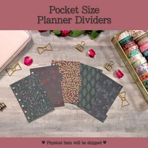 May include: Pocket Size Planner Dividers. The image shows a collection of patterned planner dividers in various designs, including floral and leaf patterns. Gold binder clips and washi tape rolls are also visible.