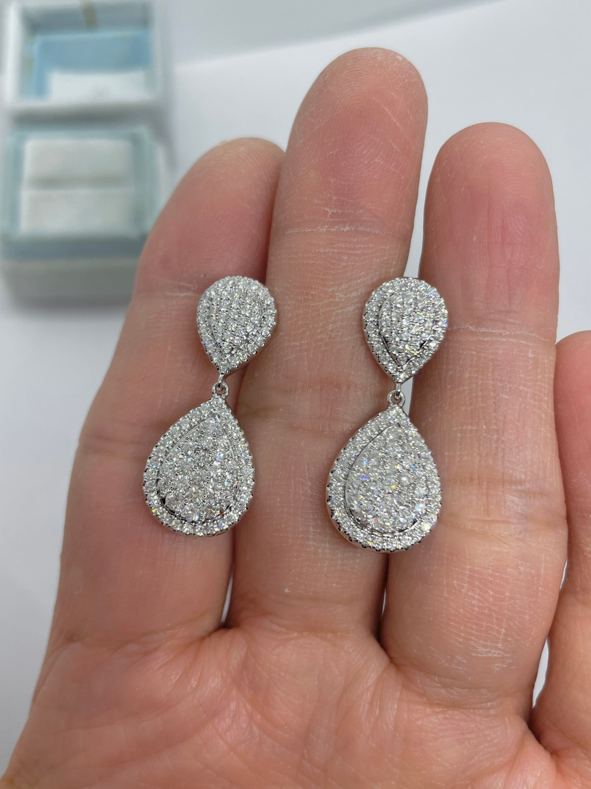 Gold diamond shaped dangle best sale earrings