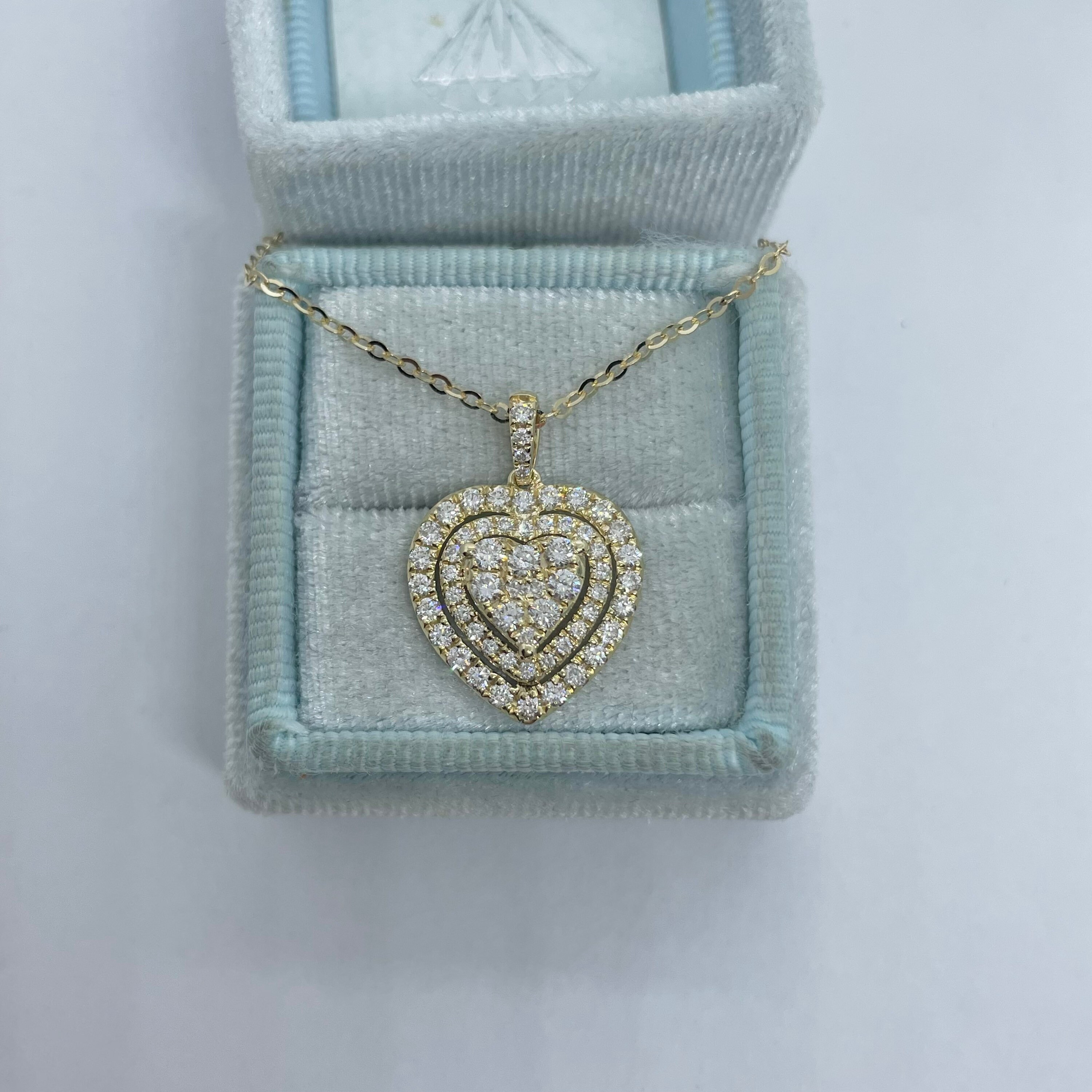 14K White Gold Floating Diamond Heart Necklace | Shin Brothers Jewelers Inc.