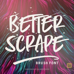 May include: White brush font with the text "BETTER SCRAPE" on a pink and blue abstract background. The text "BRUSH FONT" is below the main text. The text "MANUFACTURED BY ALAMSYAH" is on the left side of the image. The text "PUBLISHED BY ALLMOSTUDIO" is below the main text. The text "ALL MO" is in a square with a white background and black border. The text "Alam Std." is in a square with a white background and black border.