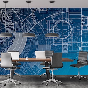 May include: A modern office meeting room with a blue wall featuring a white blueprint design. The room has a wooden table with four black office chairs with wheels.