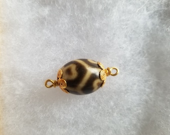 Tibetan Dzi Stone Pendant with Floral Gold Cap
