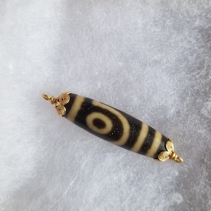 Tibetan dzi 2 Eyed high quality stone with Gold overlaid cap,Tibetan dzi beads, Dzi pendant, Tibetan vintage jewelery, tibetan pendant
