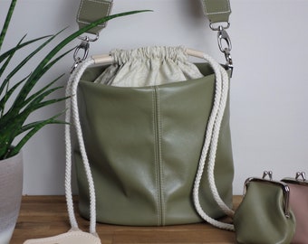 Bucket bag made of green leather with drawstring closure