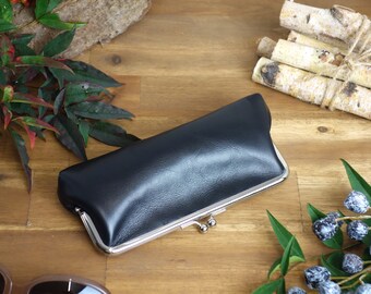 Glasses case or utensil made of leather with clip closure