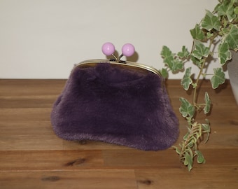 Plush cosmetic bag with clip closure