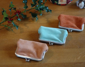 Mini purse with clip closure made of suede