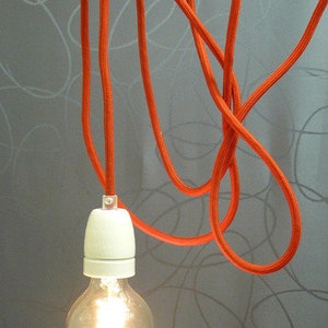Textile cable with porcelain socket and plug