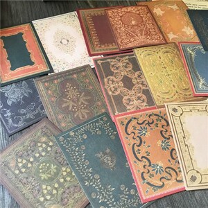 May include: A set of vintage-style decorative paper cards with intricate patterns and designs. The cards feature a variety of colors, including gold, brown, red, and blue. The cards are perfect for scrapbooking, card making, or other craft projects.