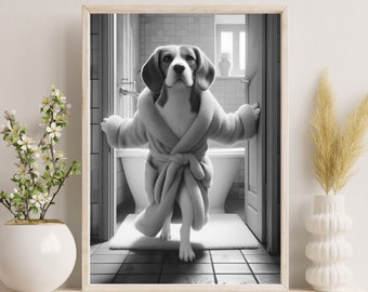 May include: A black and white photo of a dog wearing a white bathrobe, standing in a bathroom doorway. The dog is looking directly at the camera.
