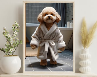 May include: A small, light brown poodle dog wearing a white bathrobe stands in a bathroom with tiled floors. The dog is looking directly at the camera.