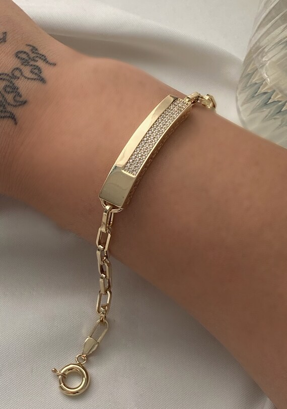 Gold bracelet on sale with plate