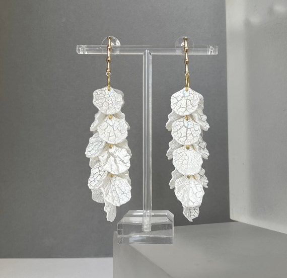 Statement white best sale earrings