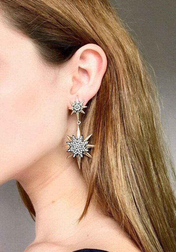 Statement star earrings deals