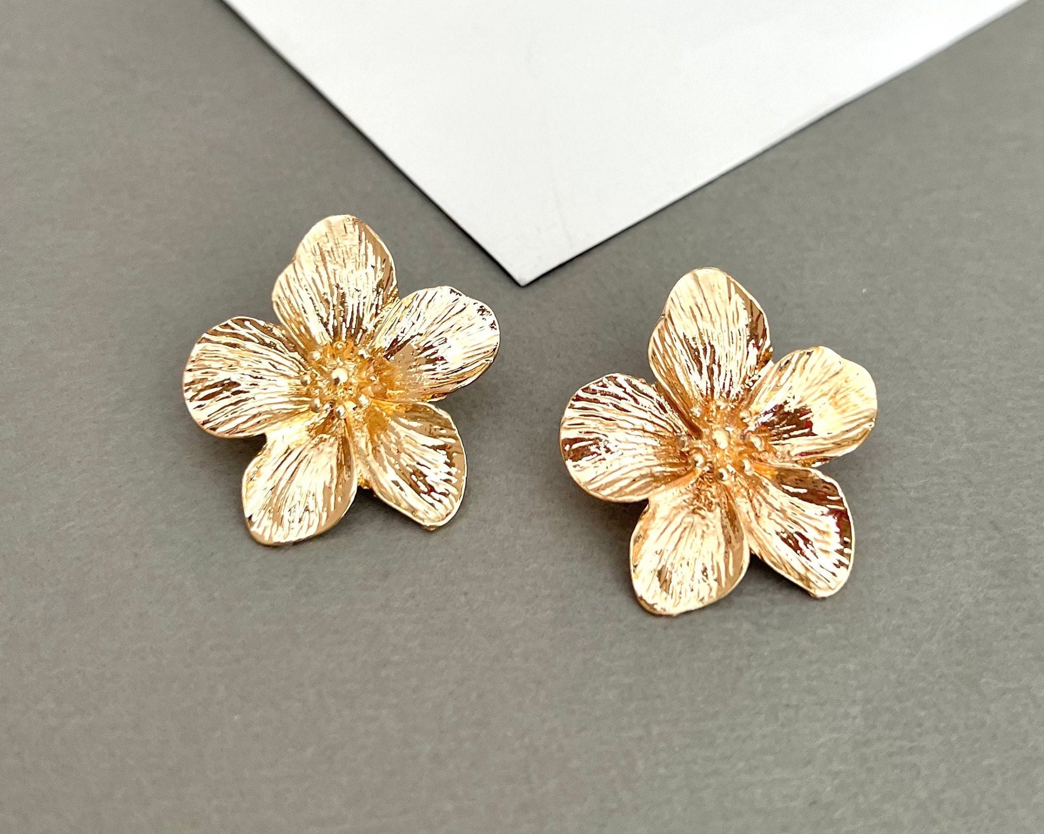 Gold floral hotsell earrings